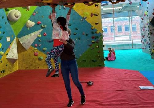 Darcey Haddow working as an Indoor Climbing Assistant
