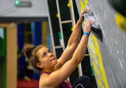 Darcey Haddow bouldering indoors