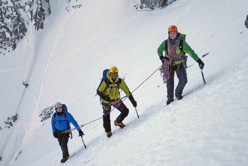 Sam Leary with clients on Ledge Route