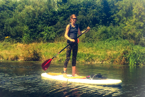 Lisa stand up paddle boarding